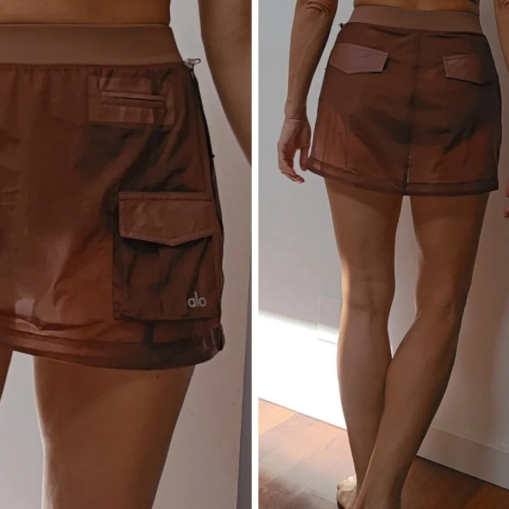 nwot Alo yoga sheer effusion cargo pocket lined active mini skirt S
